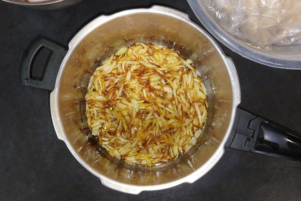 Sautéing the onions until golden brown